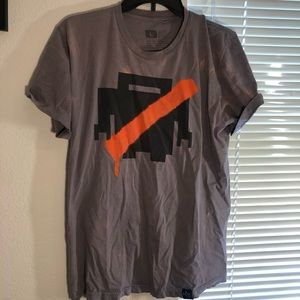 Large dark gray Trip Lee shirt. With bleach stains